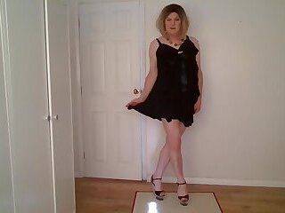 Little black dress, G-string and stripper heels - ashemaletube.com